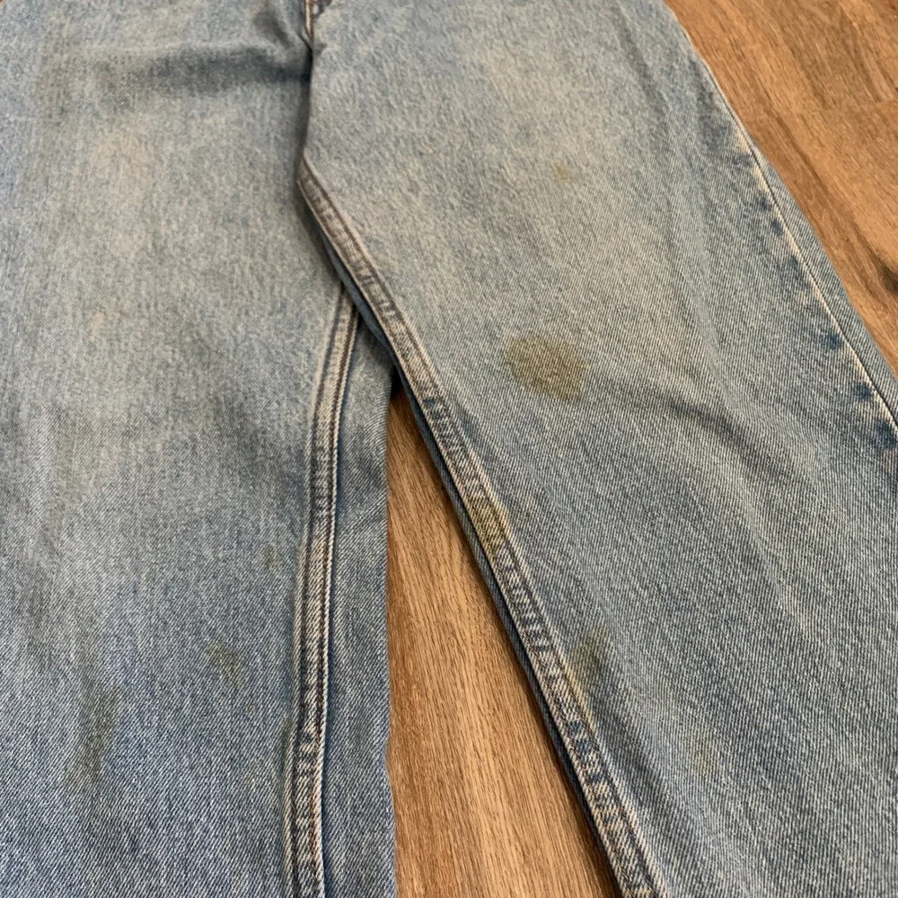 Vintage 80s Levi's 550 orange tab tapered leg denim jeans in light wash - 30x30‎